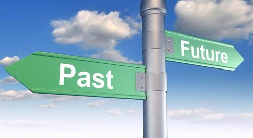 A road sign pointing to the past and the future.